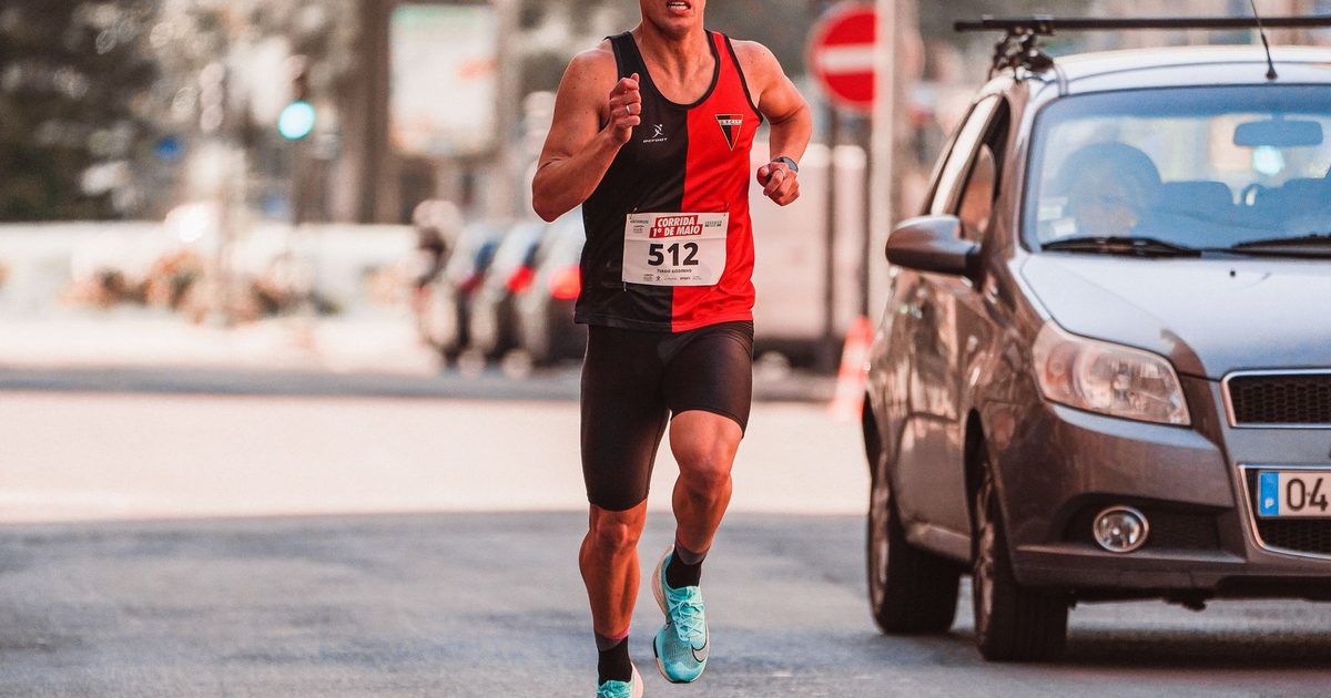Athlete participating in a city marathon, showcasing endurance and focus.