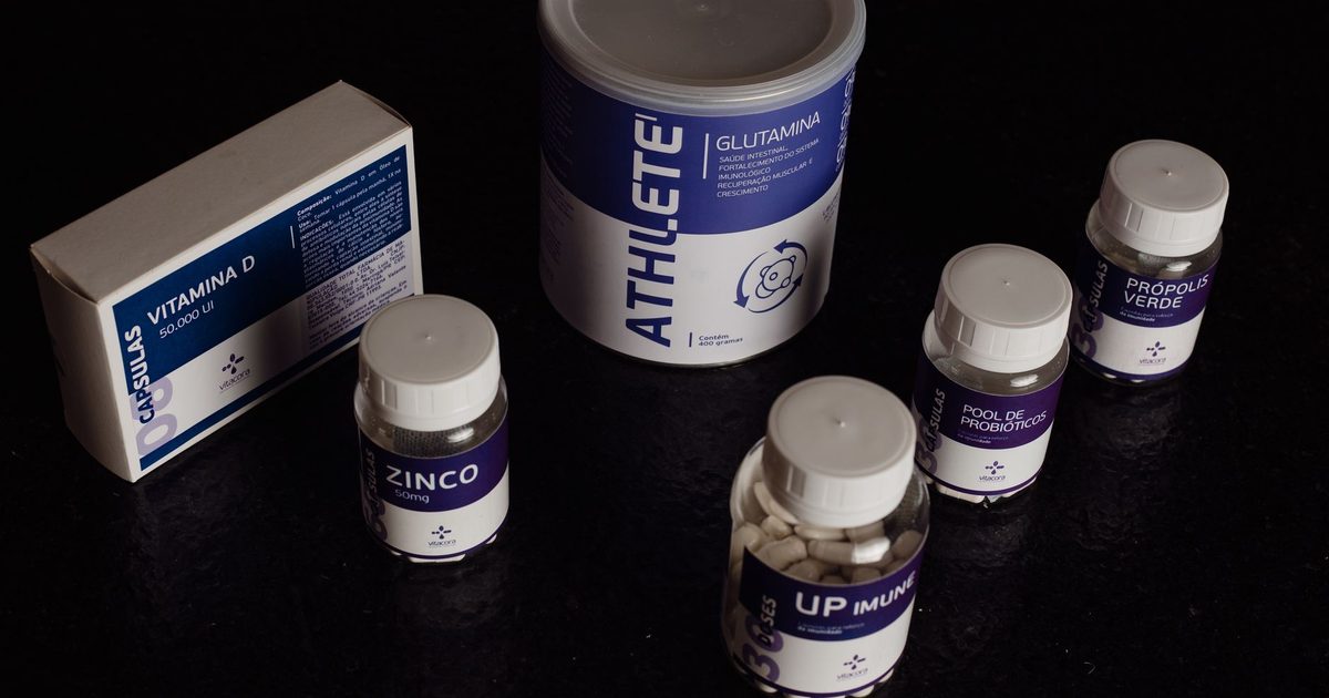 Close-up of a variety of nutritional supplements, vitamins, and probiotics.